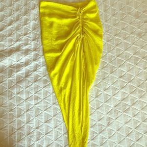 Bright yellow asymmetrical skirt